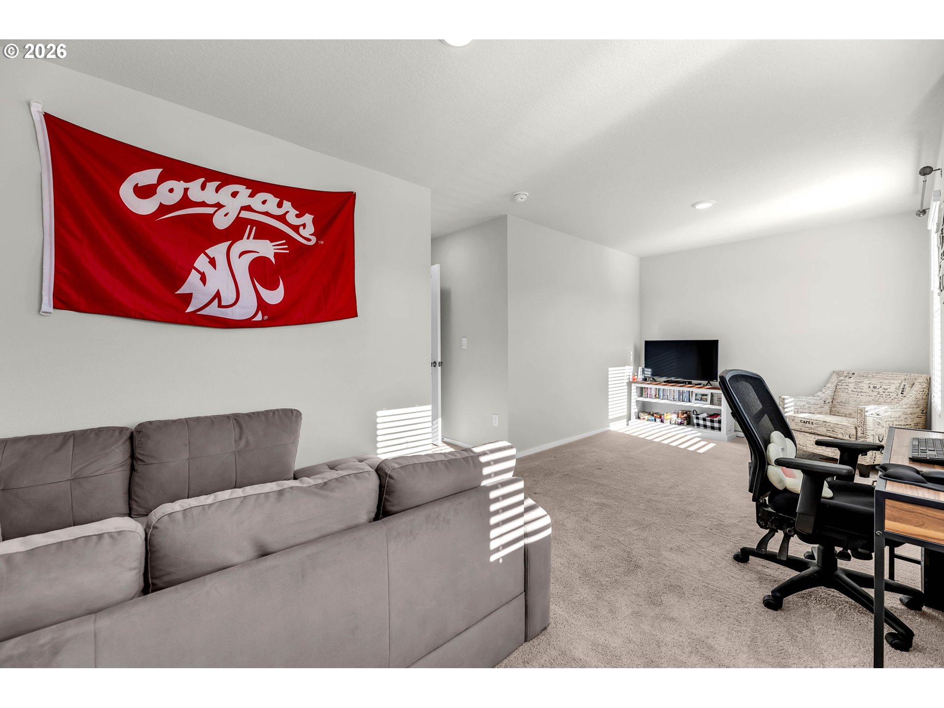2936 North 3rd Way Ridgefield, WA 98642 - Photo 37 of 44 a living room with furniture and a work place
