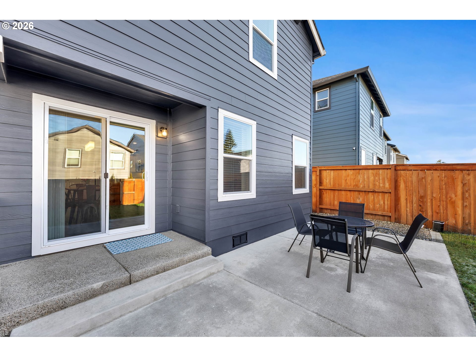 2936 North 3rd Way Ridgefield, WA 98642 - Photo 40 of 44 a backyard of a house with outdoor seating