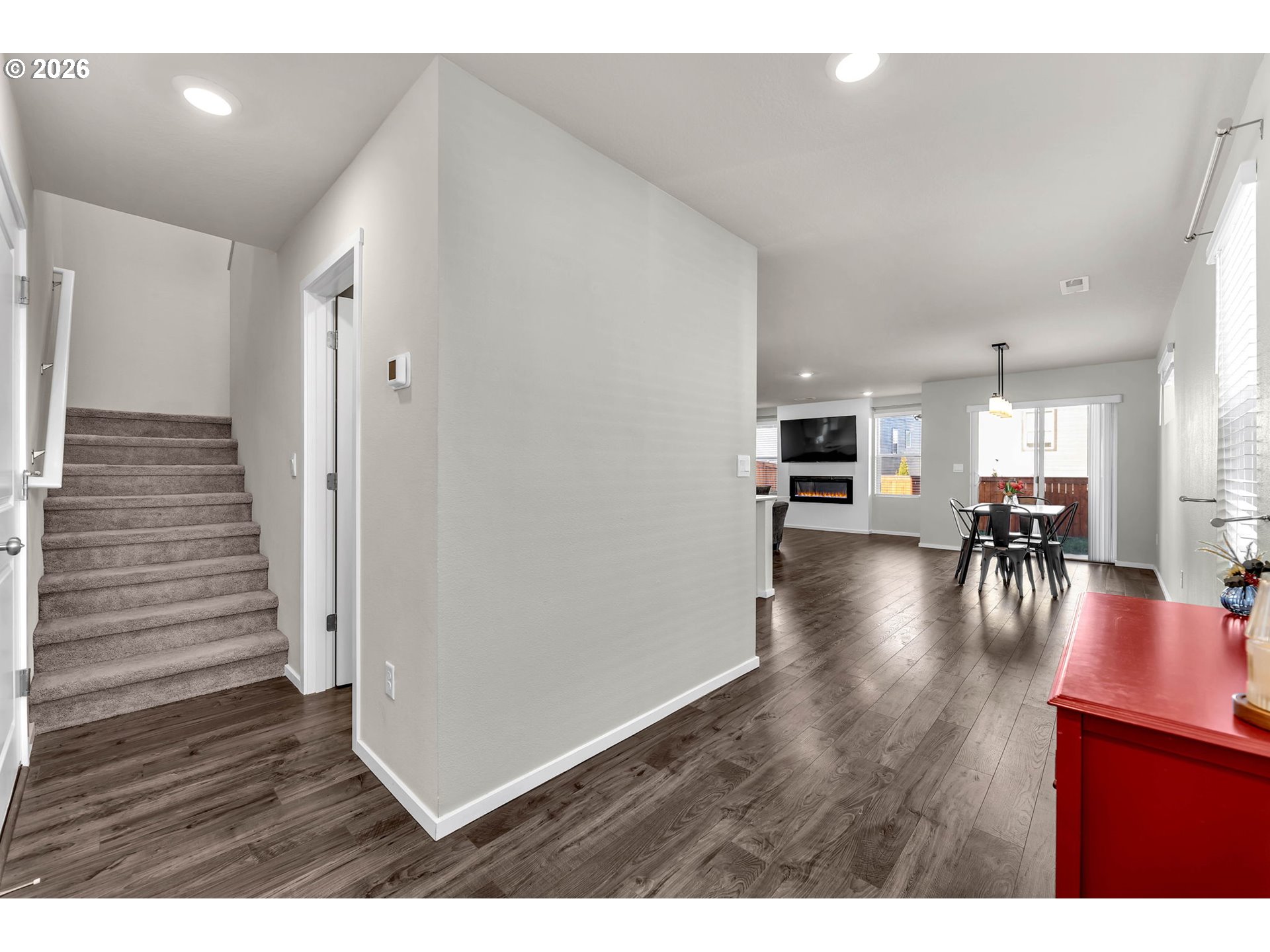 2936 North 3rd Way Ridgefield, WA 98642 - Photo 6 of 44 a view of kitchen and dining room with wooden floor