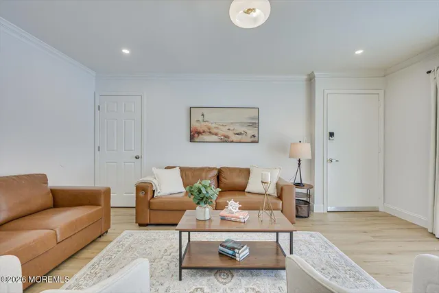 a kitchen with a sink appliances and cabinets