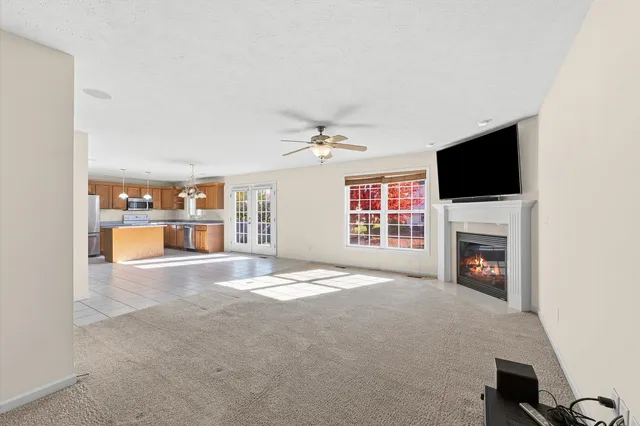 a large kitchen with cabinets and stainless steel appliances