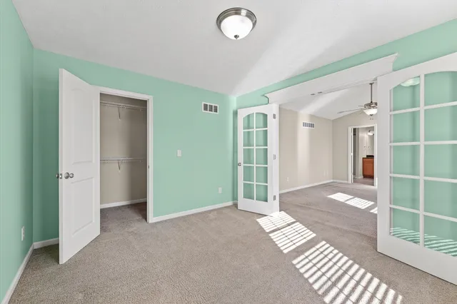 an empty room with windows