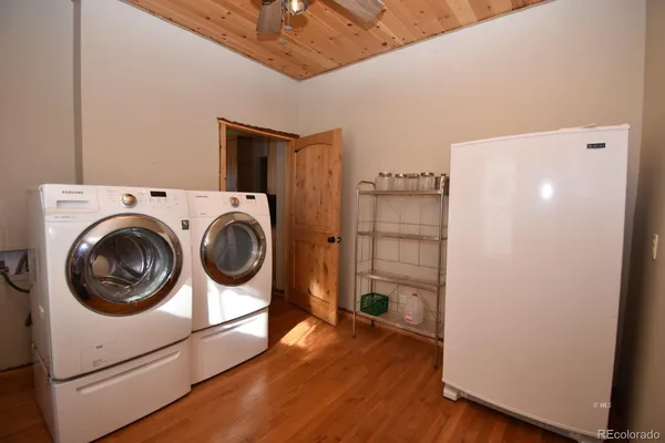 a utility room with dryer and washer
