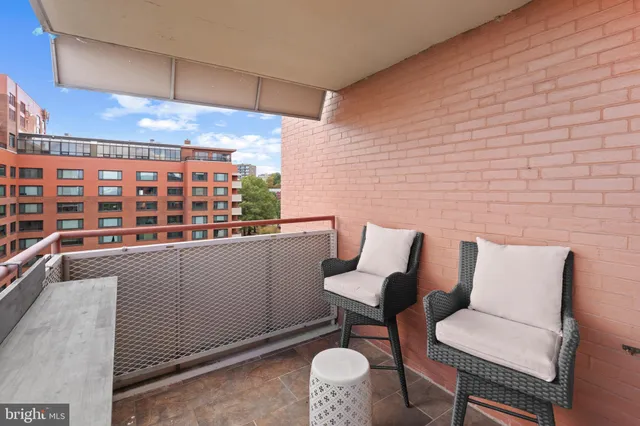 a balcony with a couch