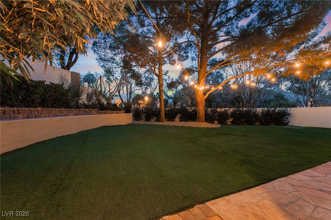 104 Quail Run Road Henderson, NV 89014 - Photo 27 of 94 Side yard with artificial grass