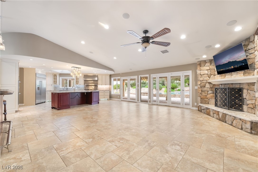 104 Quail Run Road Henderson, NV 89014 - Photo 33 of 94 Expansive great room with large fireplace and flatscreen