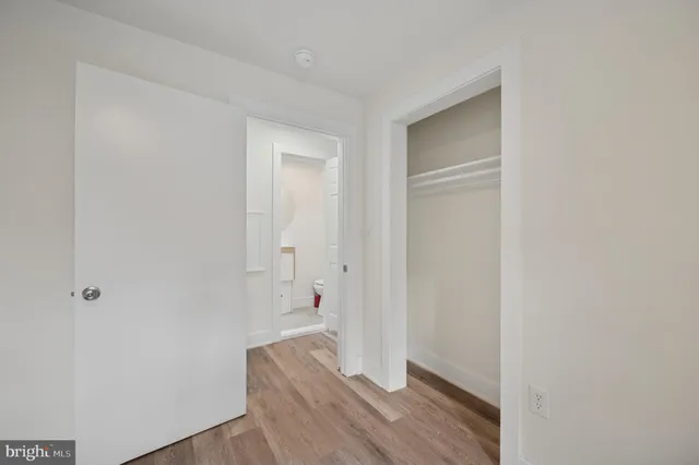 a view of bathroom with wooden floor