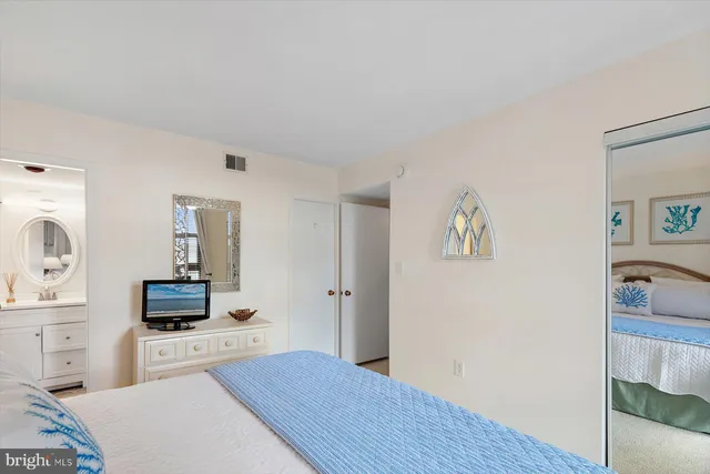 a kitchen with a stove and a refrigerator