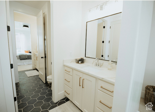 1577 North 1350 E Street, Unit 1 Mapleton, UT 84664 - Photo 10 of 15 Ensuite bathroom featuring vanity and tile patterned floors