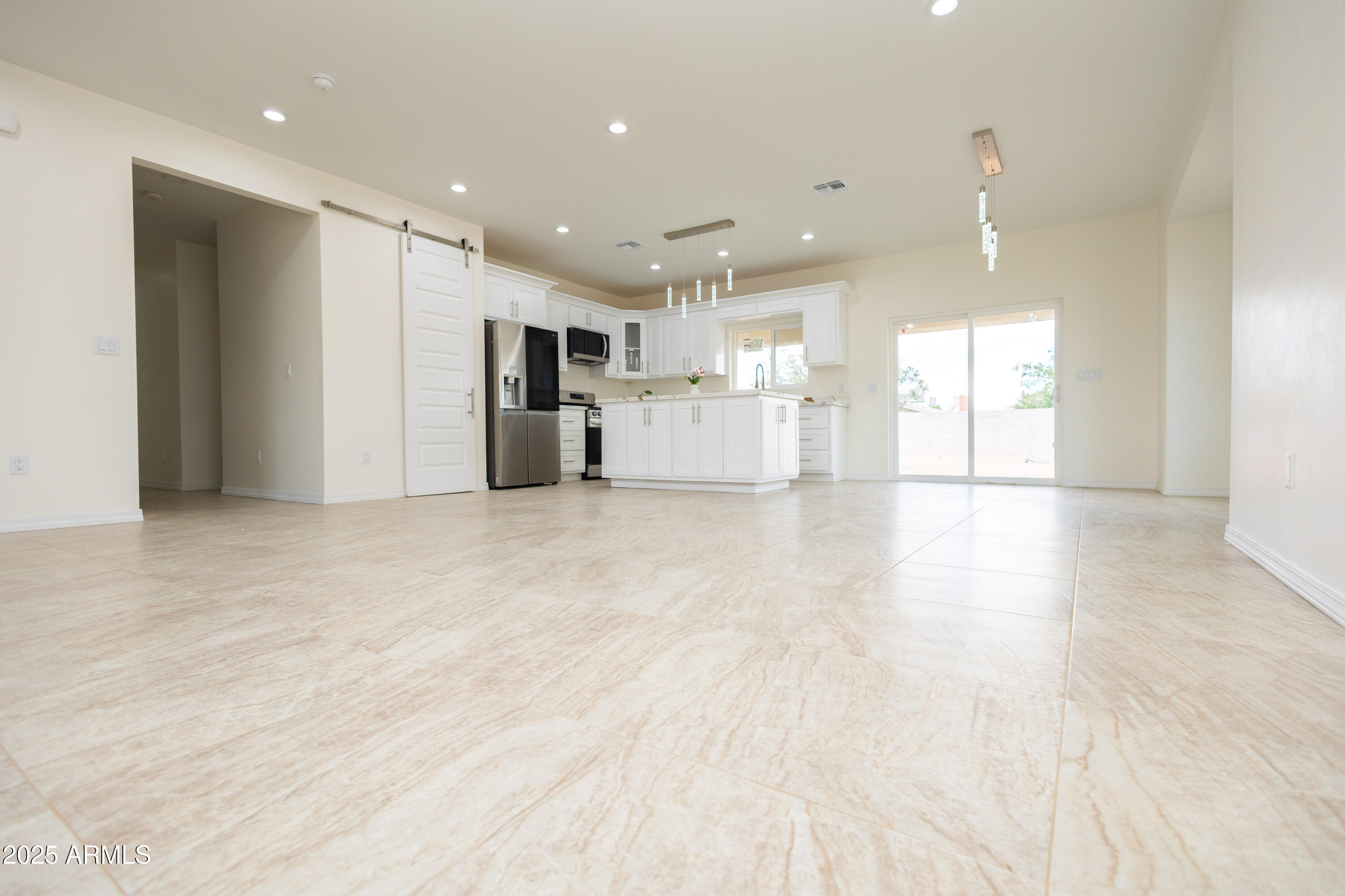 2010 East 13th Street Douglas, AZ 85607 - Photo 14 of 53 a view of kitchen with refrigerator and window