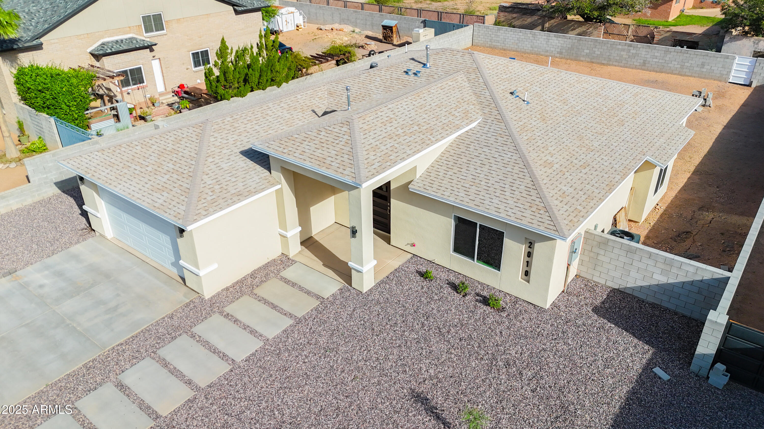 2010 East 13th Street Douglas, AZ 85607 - Photo 2 of 53 an aerial view of a house with roof deck and furniture