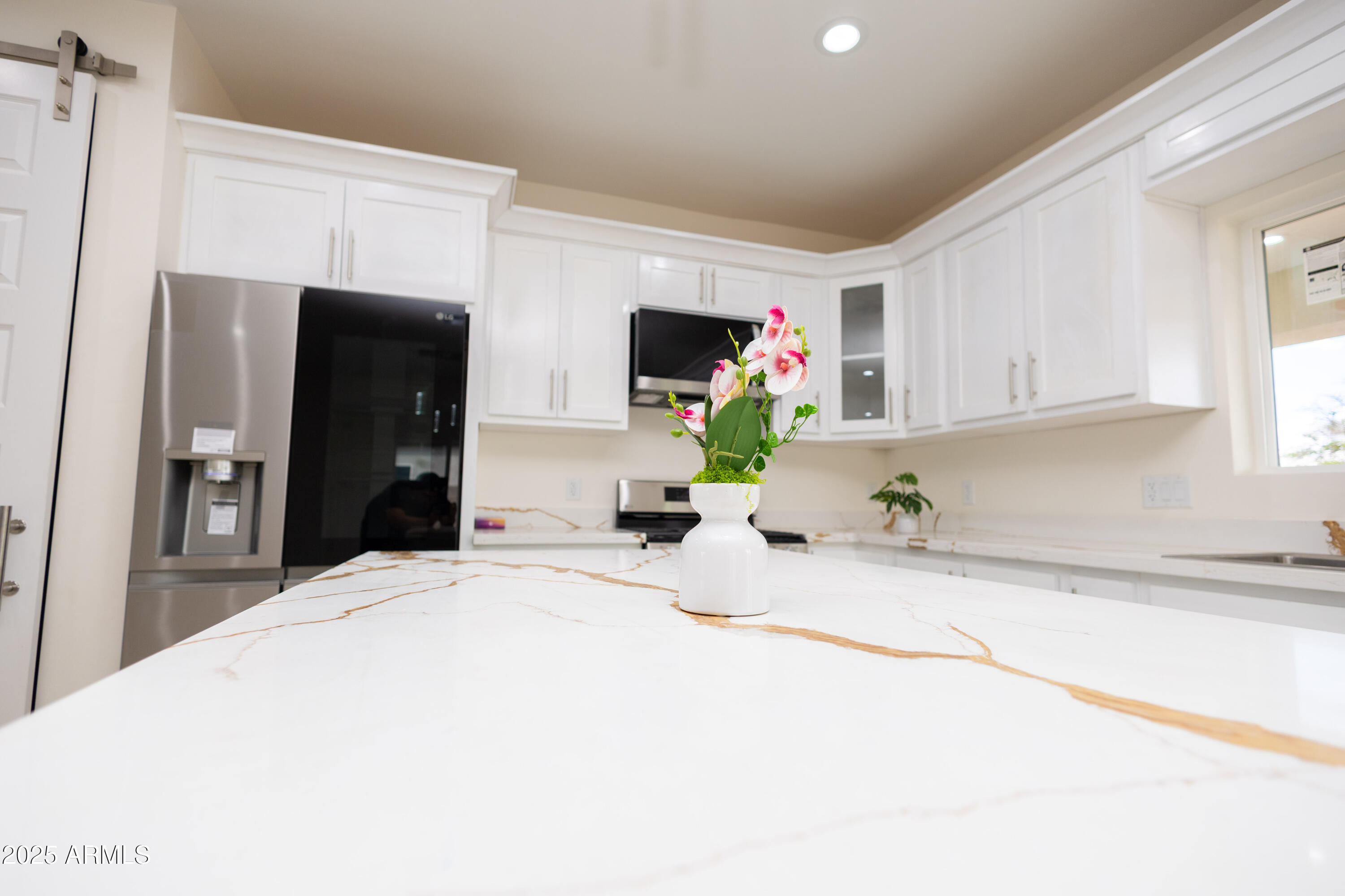 2010 East 13th Street Douglas, AZ 85607 - Photo 22 of 53 a bedroom with a bed and a cabinets