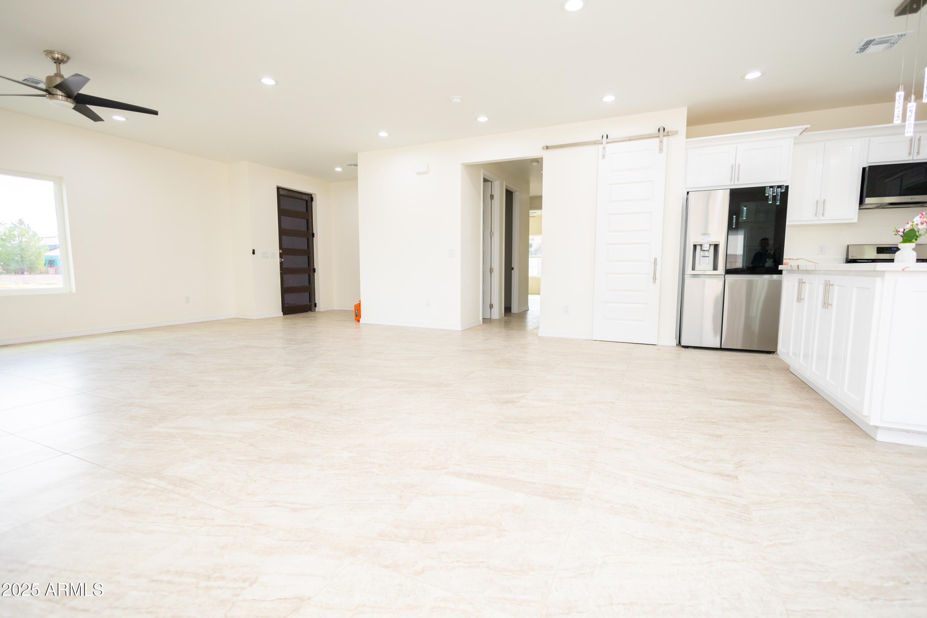 2010 East 13th Street Douglas, AZ 85607 - Photo 26 of 53 a view of kitchen with refrigerator and windows