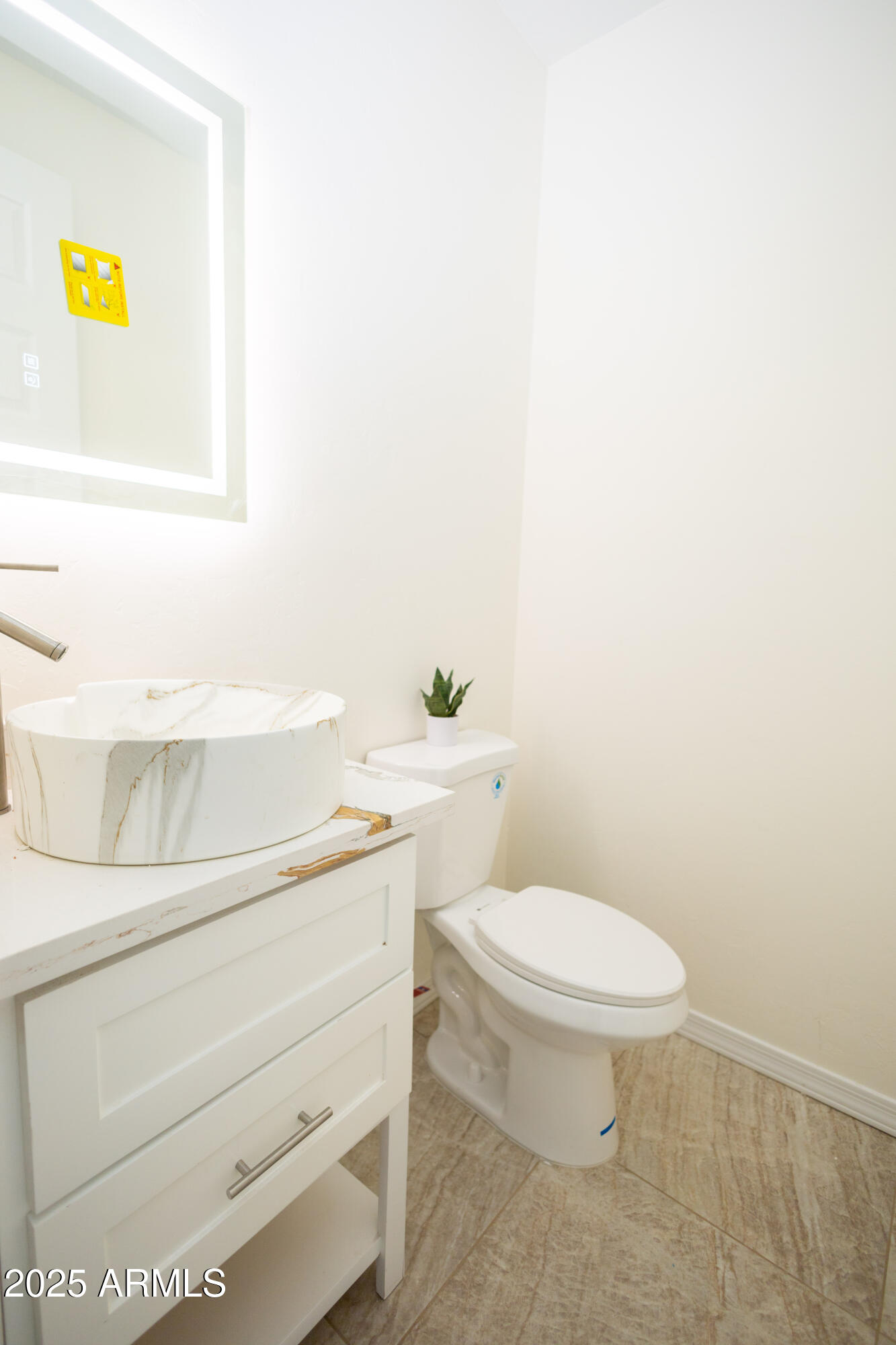 2010 East 13th Street Douglas, AZ 85607 - Photo 28 of 53 a bathroom with a sink a toilet and vanity