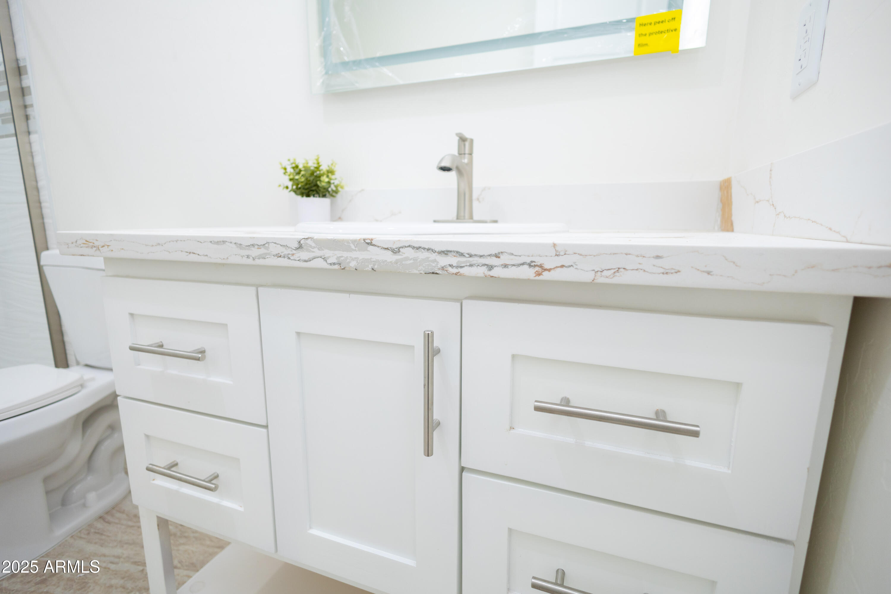 2010 East 13th Street Douglas, AZ 85607 - Photo 35 of 53 a bathroom with a sink and a toilet