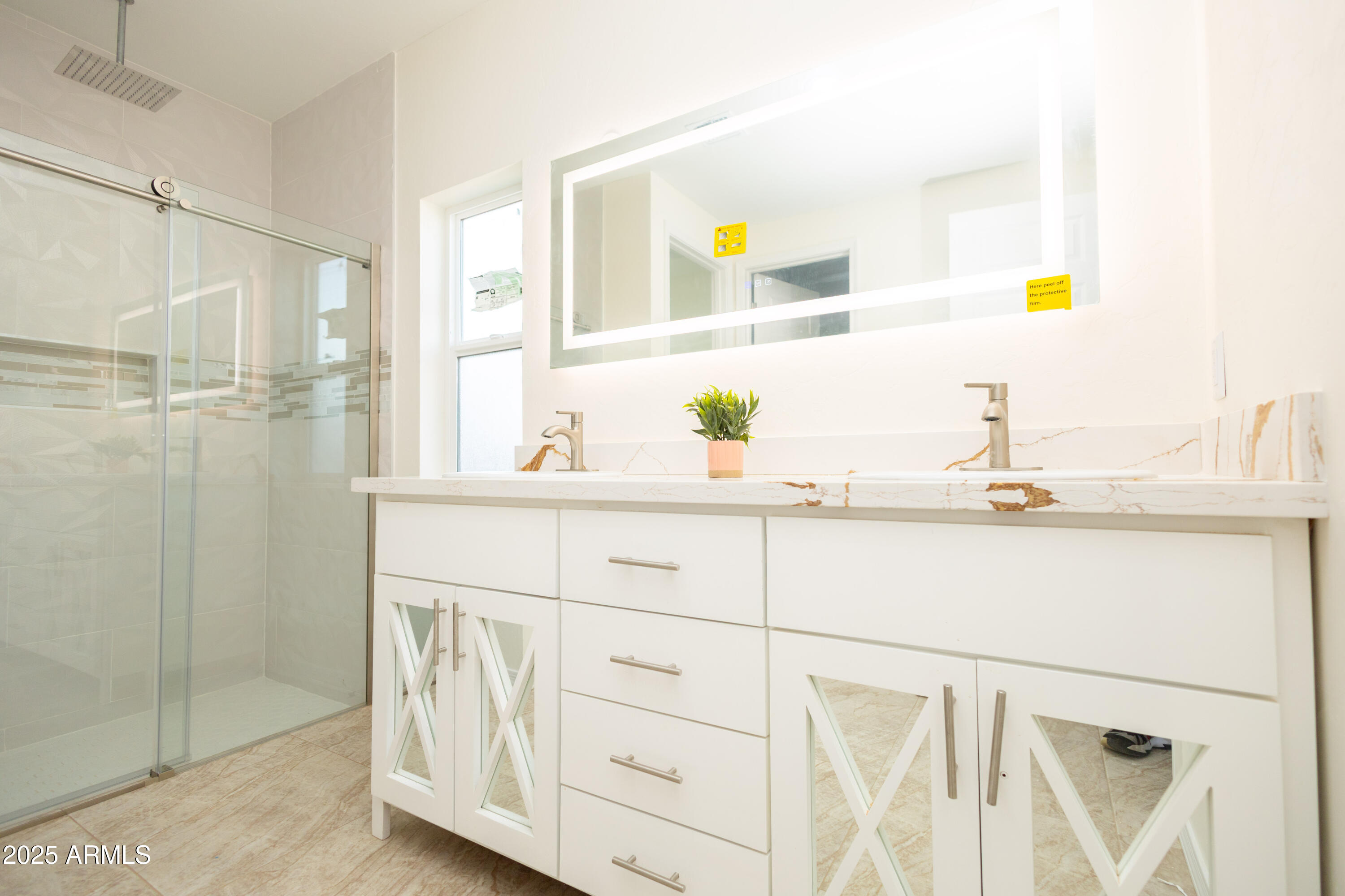 2010 East 13th Street Douglas, AZ 85607 - Photo 42 of 53 a bathroom with a sink and a mirror