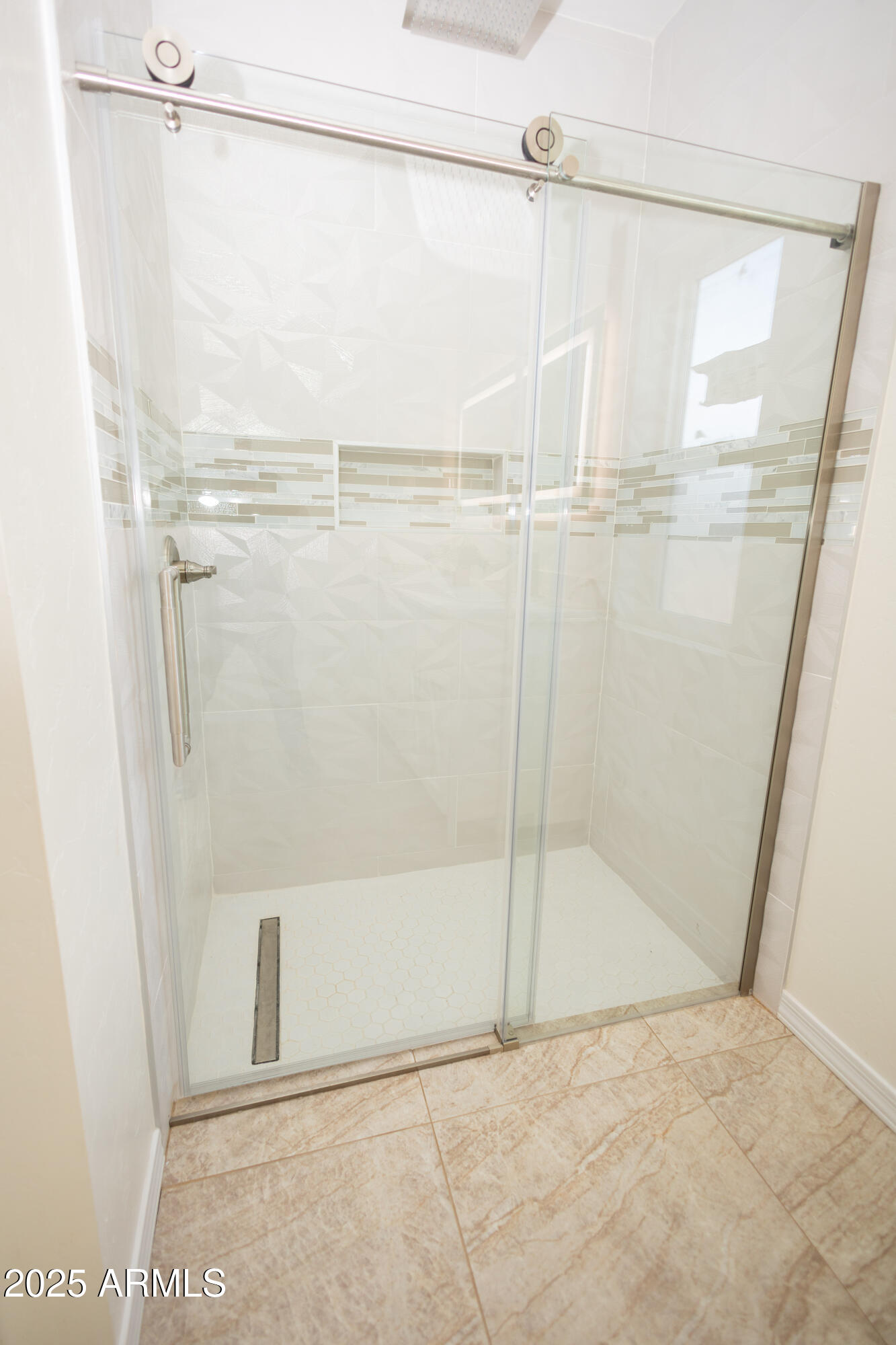 2010 East 13th Street Douglas, AZ 85607 - Photo 44 of 53 a bathroom with a glass shower door