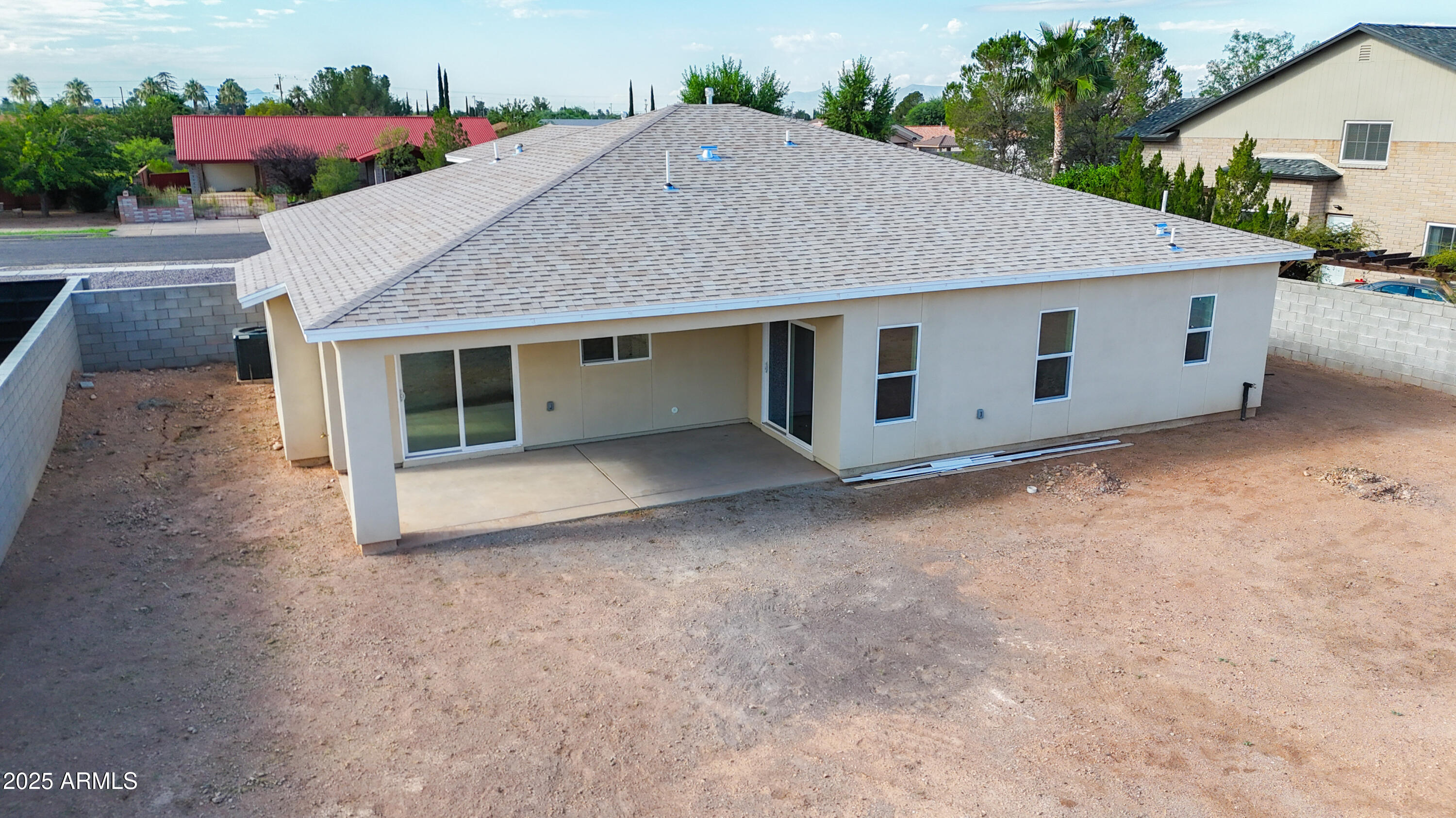 2010 East 13th Street Douglas, AZ 85607 - Photo 6 of 53 a house with trees in front of it