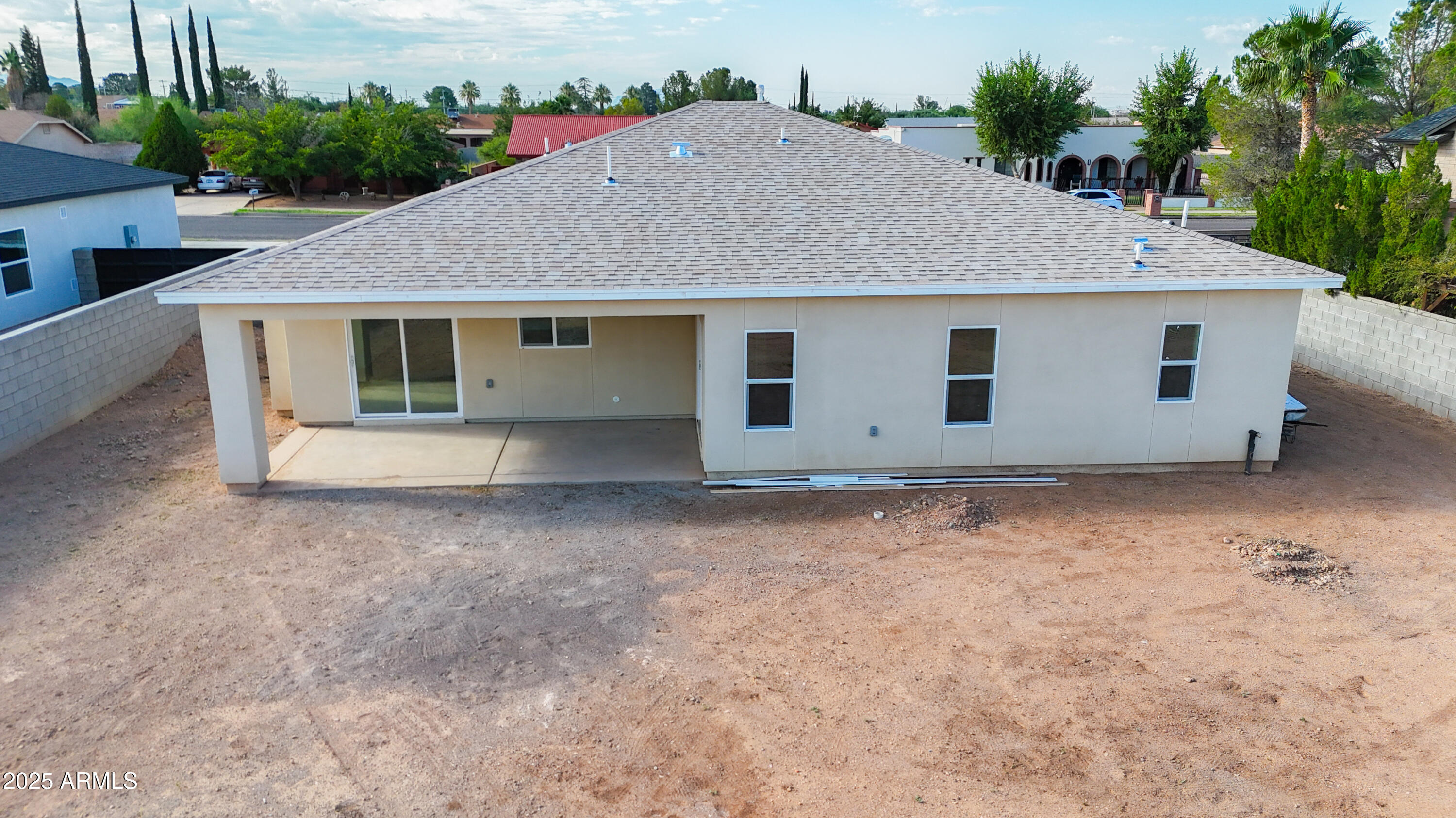 2010 East 13th Street Douglas, AZ 85607 - Photo 7 of 53 a house with trees in the background