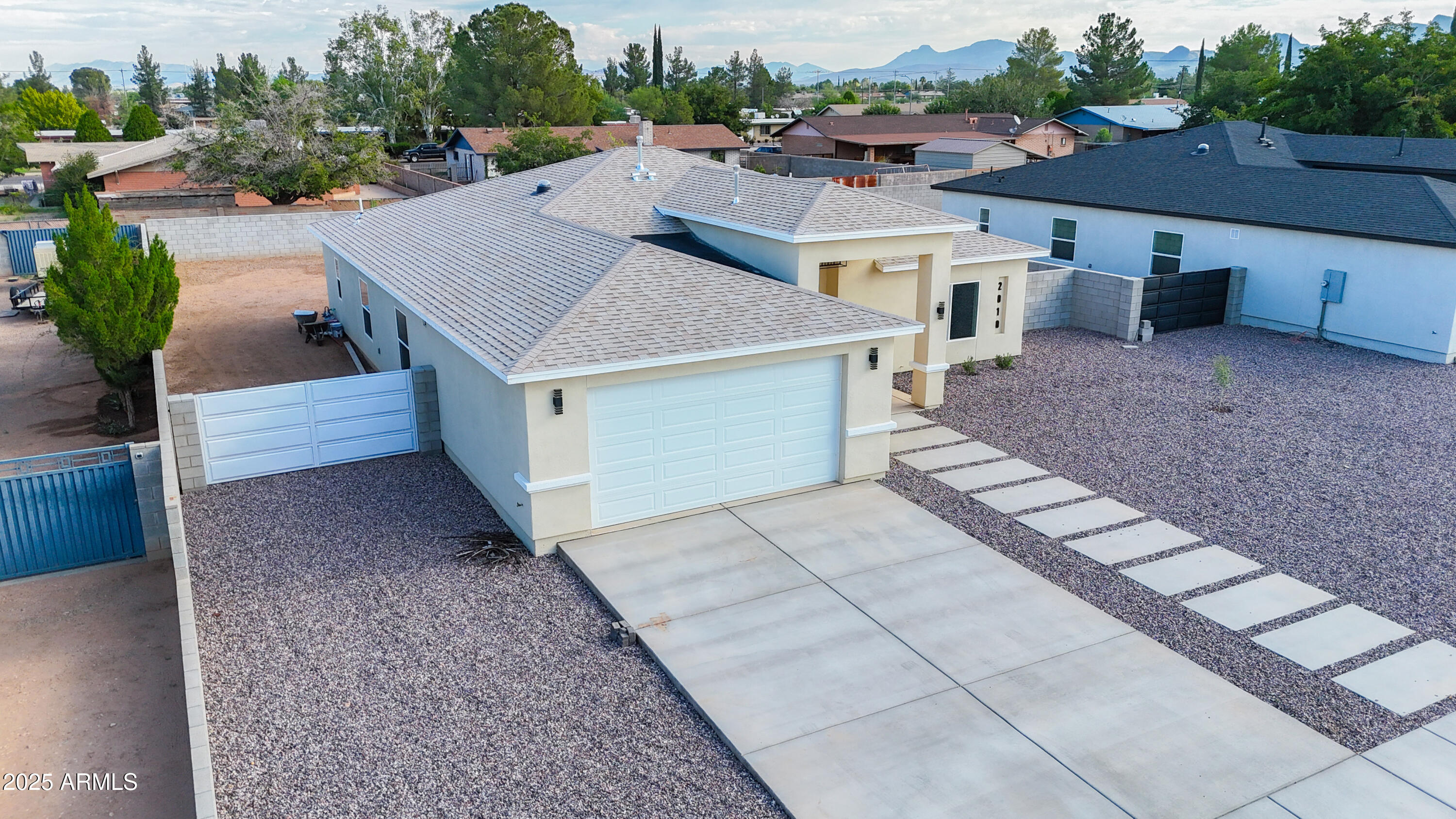 2010 East 13th Street Douglas, AZ 85607 - Photo 10 of 53 a aerial view of a house with a yard and potted plants