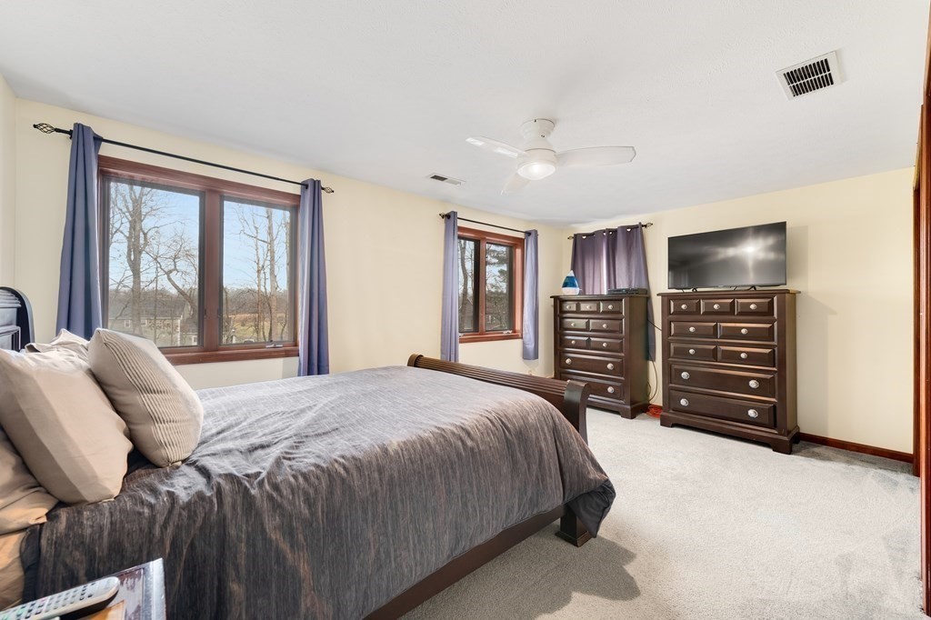 47 Strong Road Southampton, MA 01073 - Photo 20 of 42 a bedroom with a bed and furniture