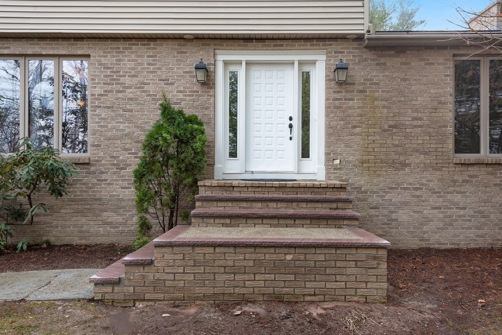 47 Strong Road Southampton, MA 01073 - Photo 3 of 42 a front view of a house with stairs