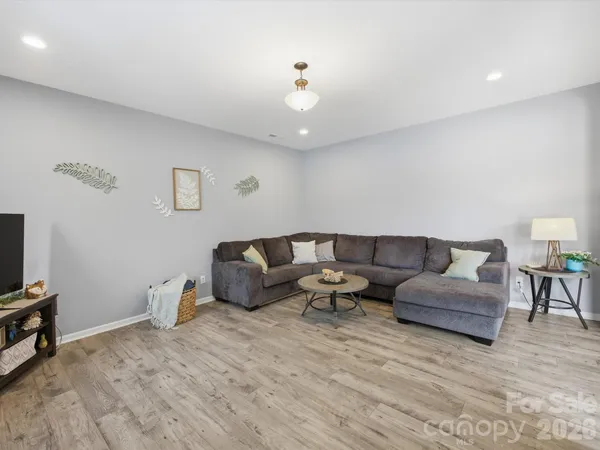 a bathroom with a sink a mirror and shower