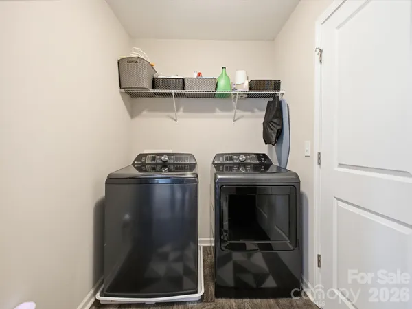 a view of a garage with a bike and lots of windows