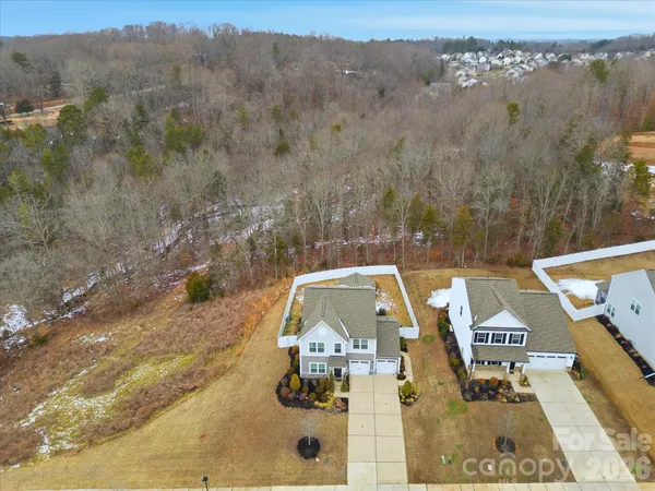 an aerial view of residential house with outdoor space