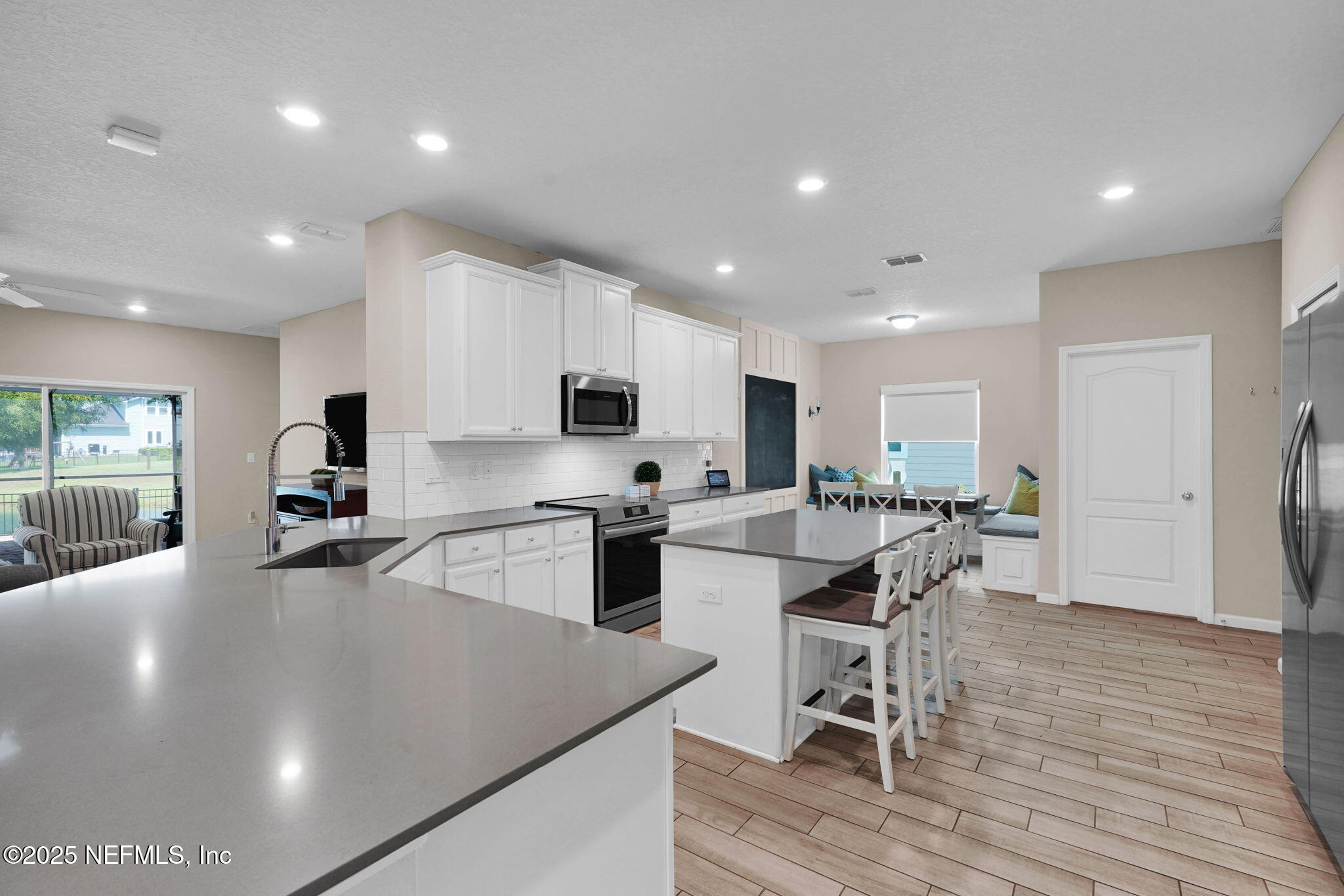 44 Athens Drive St. Augustine, FL 32092 - Photo 11 of 46 a kitchen with a sink stainless steel appliances and cabinets