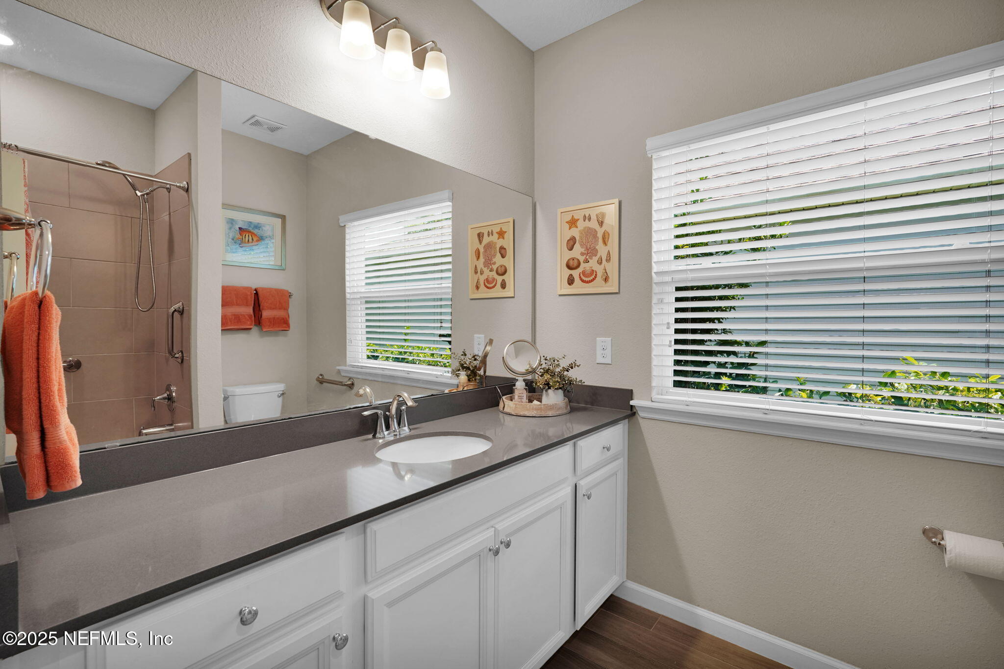 44 Athens Drive St. Augustine, FL 32092 - Photo 20 of 46 a bathroom with a sink and a window