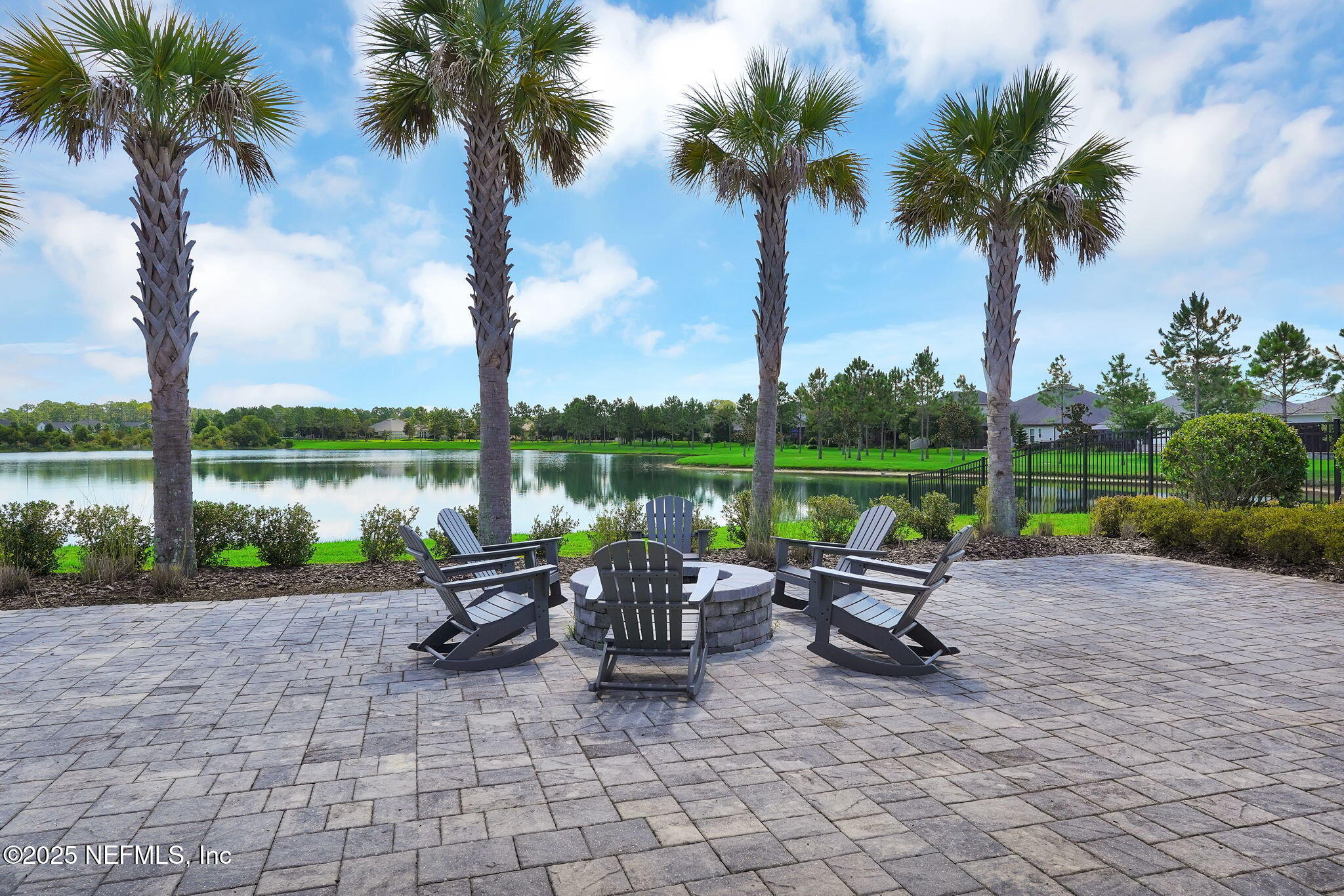 44 Athens Drive St. Augustine, FL 32092 - Photo 42 of 46 a view of swimming pool with a table and chairs