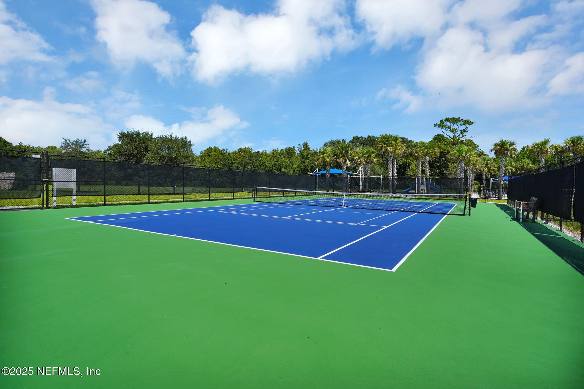 44 Athens Drive St. Augustine, FL 32092 - Photo 45 of 46 a view of an outdoor space and tennis court