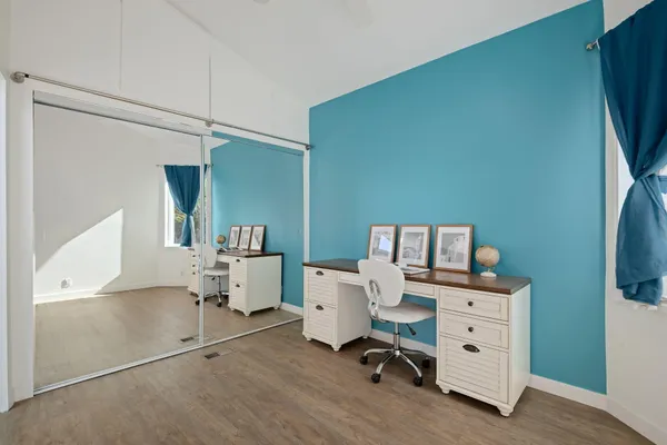 a view of a workspace with furniture