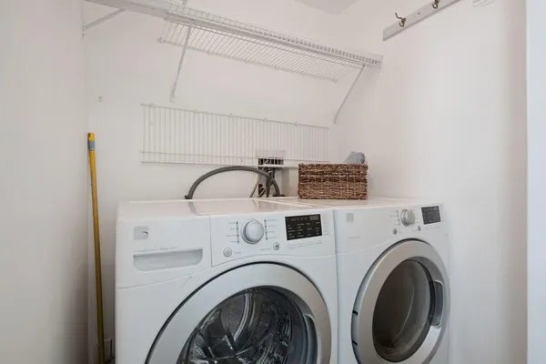 a utility room with dryer and washer