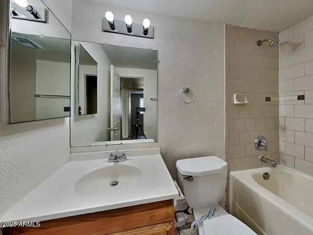 a view of a backyard of the house