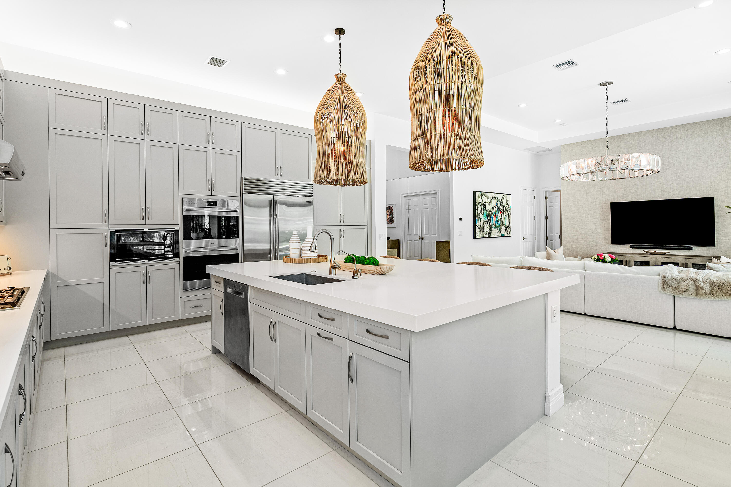 9594 Vescovato Way Boca Raton, FL 33496 - Photo 13 of 67 a kitchen with stainless steel appliances a stove sink and microwave