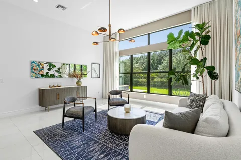 a bathroom with a double vanity sink a mirror and a bathtub