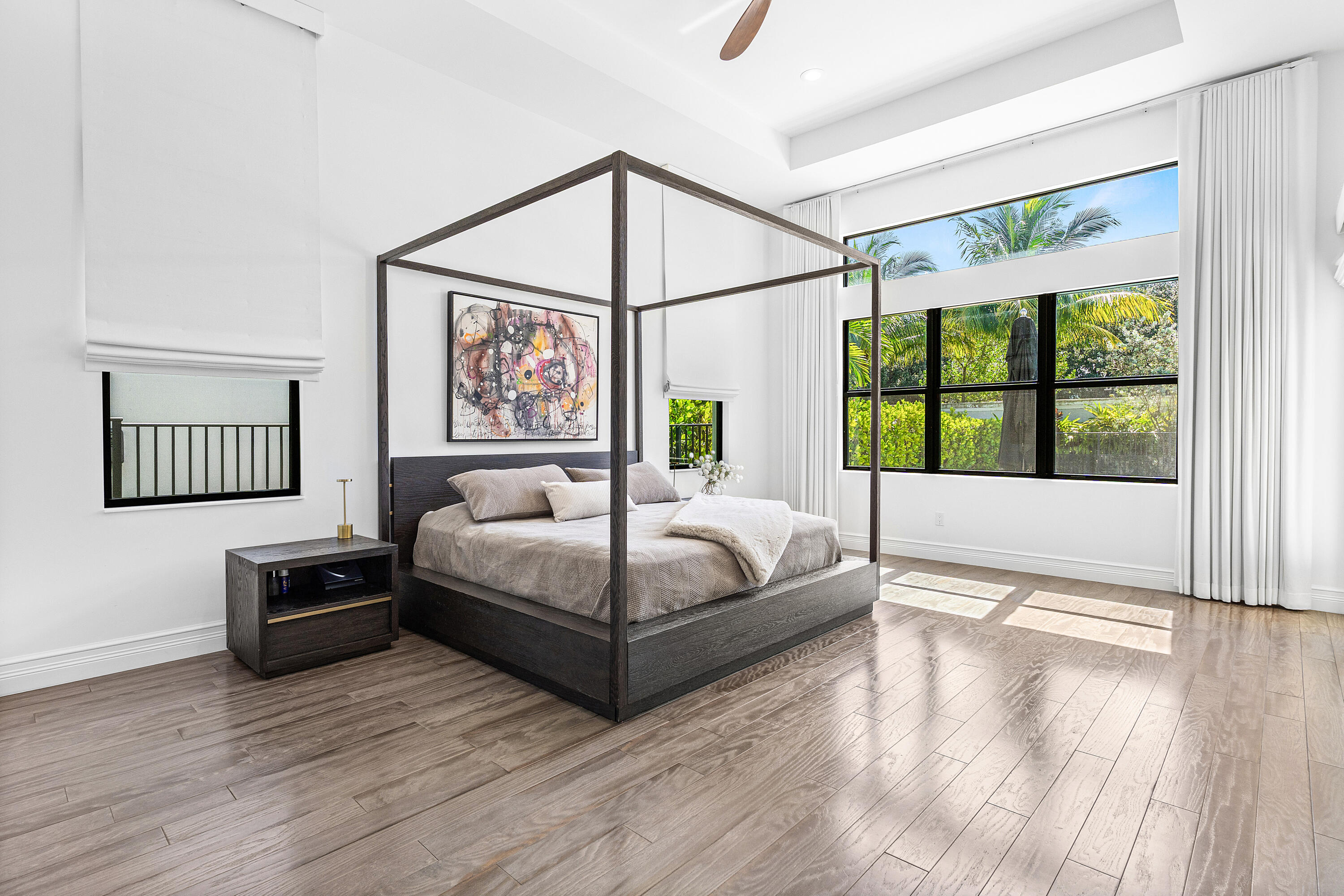 9594 Vescovato Way Boca Raton, FL 33496 - Photo 19 of 67 a bedroom with a bed and a large window