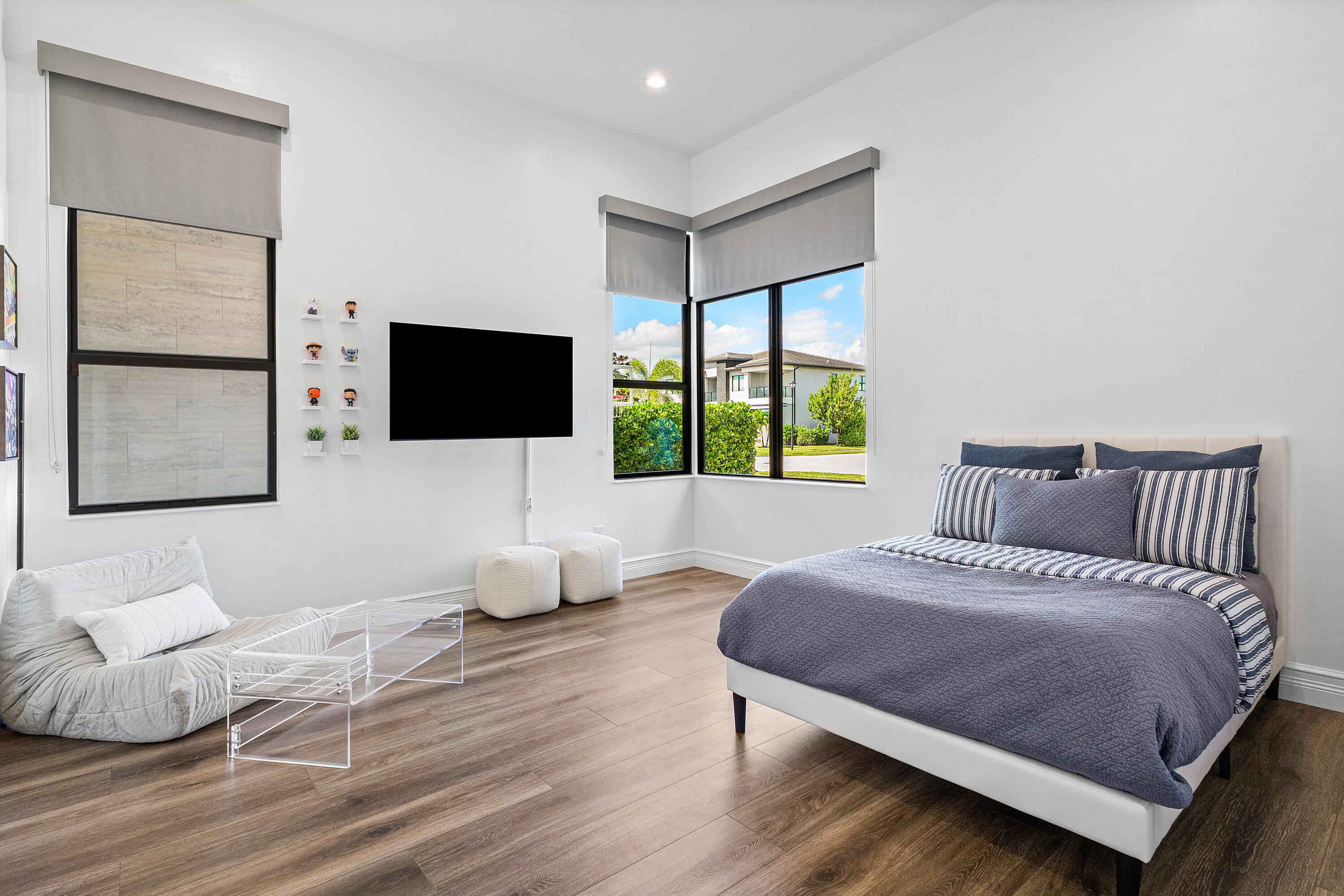 9594 Vescovato Way Boca Raton, FL 33496 - Photo 26 of 67 a bedroom with a bed and glass window