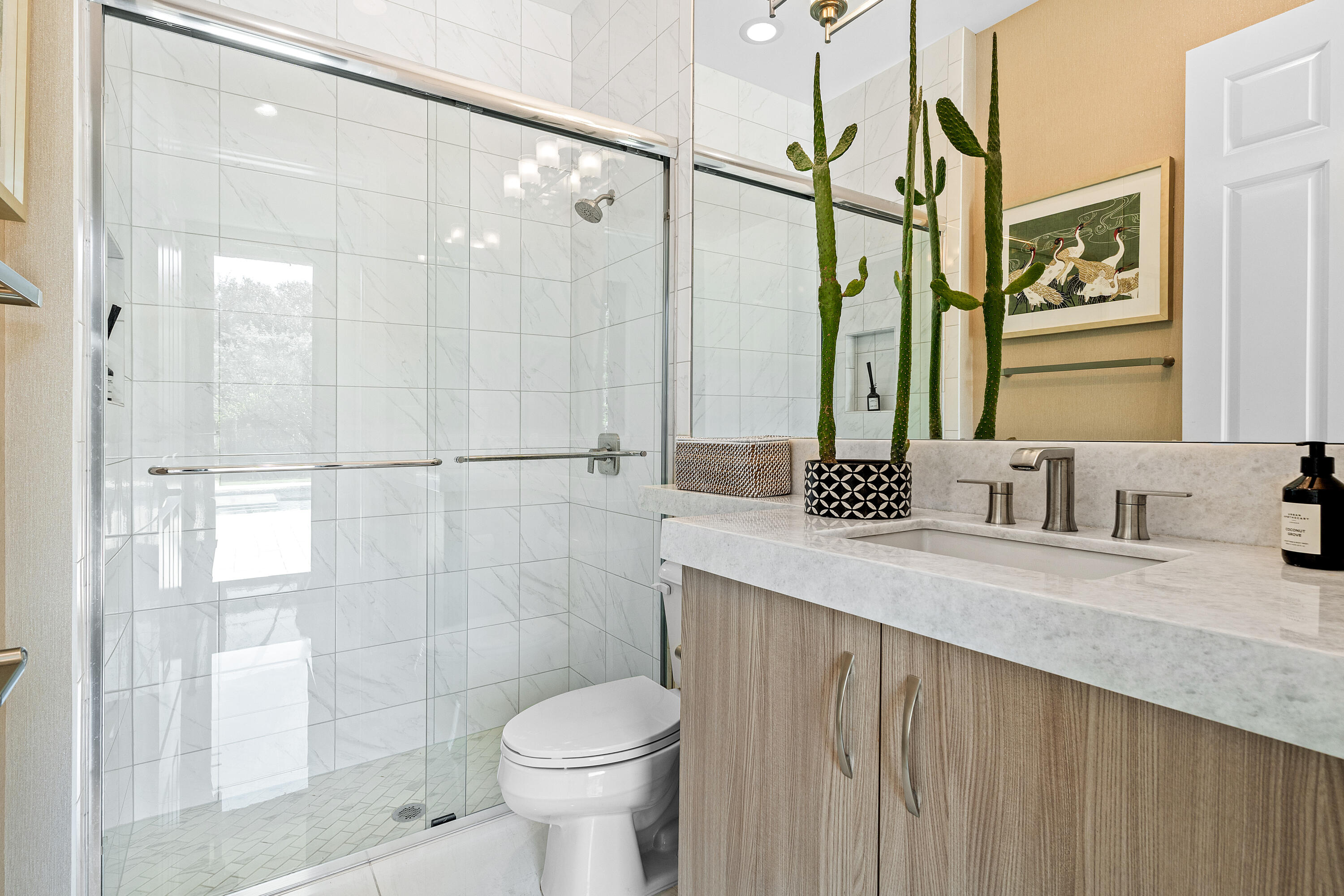 9594 Vescovato Way Boca Raton, FL 33496 - Photo 28 of 67 a bathroom with a granite countertop sink a toilet and shower