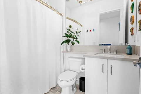 a view of swimming pool with chairs