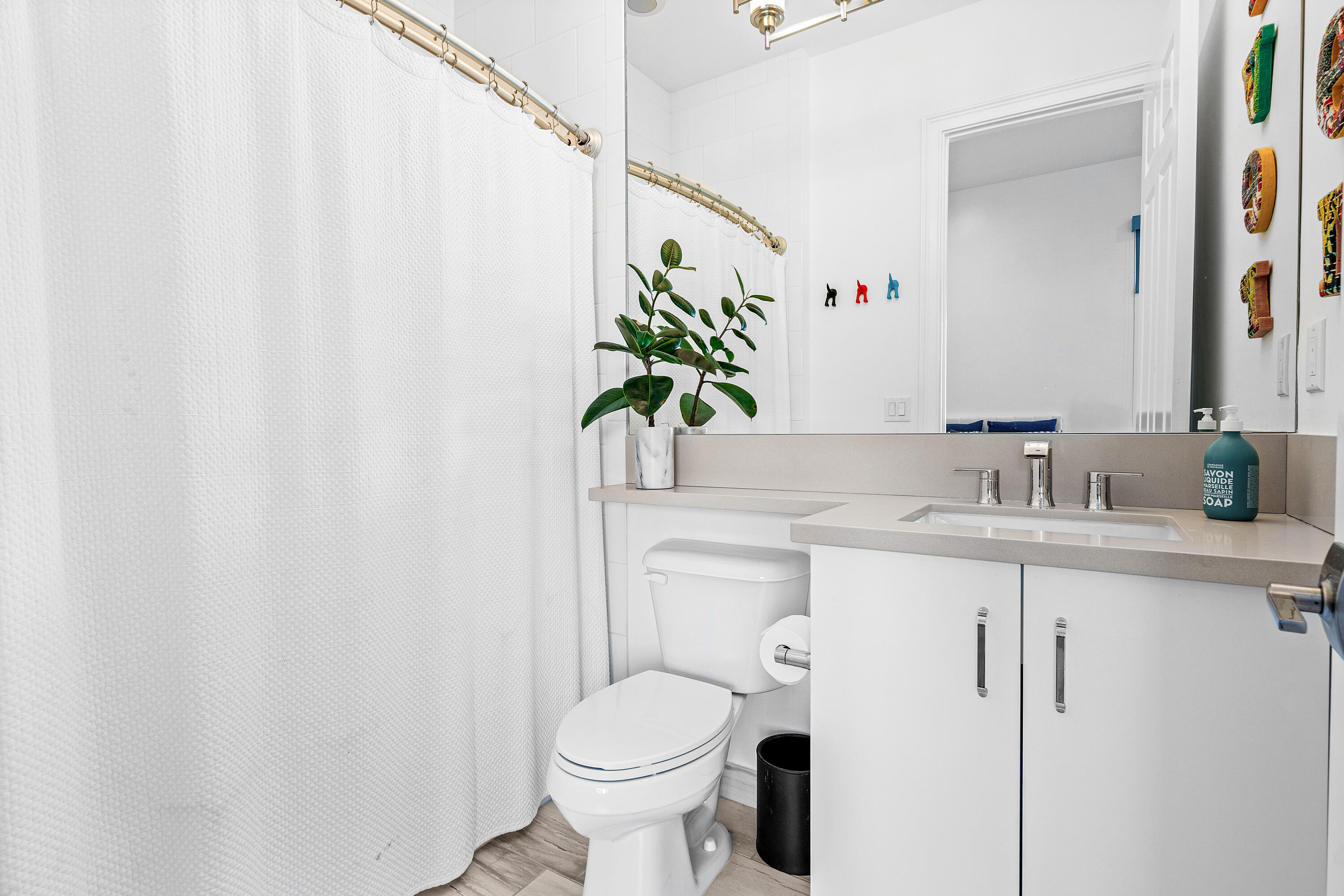 9594 Vescovato Way Boca Raton, FL 33496 - Photo 30 of 67 a bathroom with a granite countertop sink and a toilet