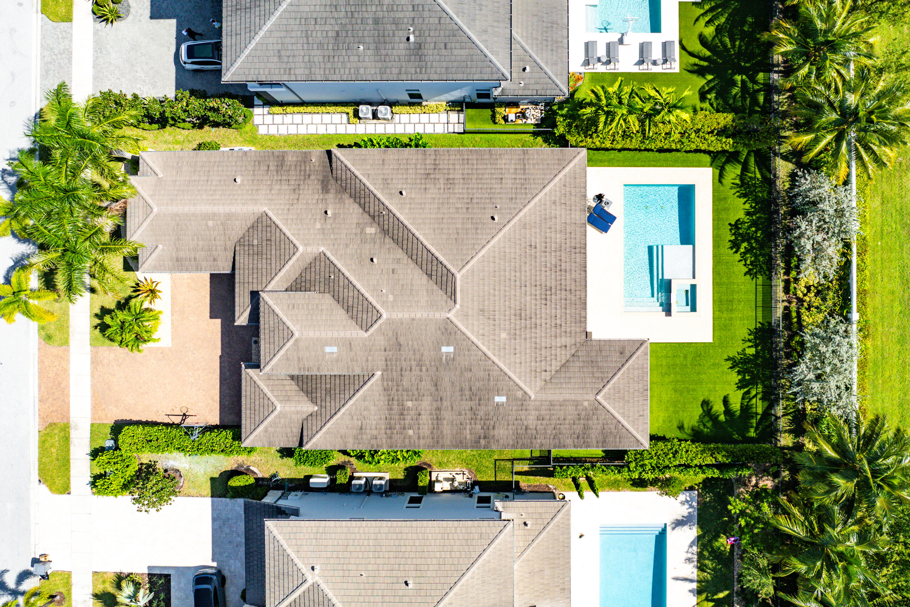 9594 Vescovato Way Boca Raton, FL 33496 - Photo 38 of 67 an aerial view of a house with a yard and a fountain