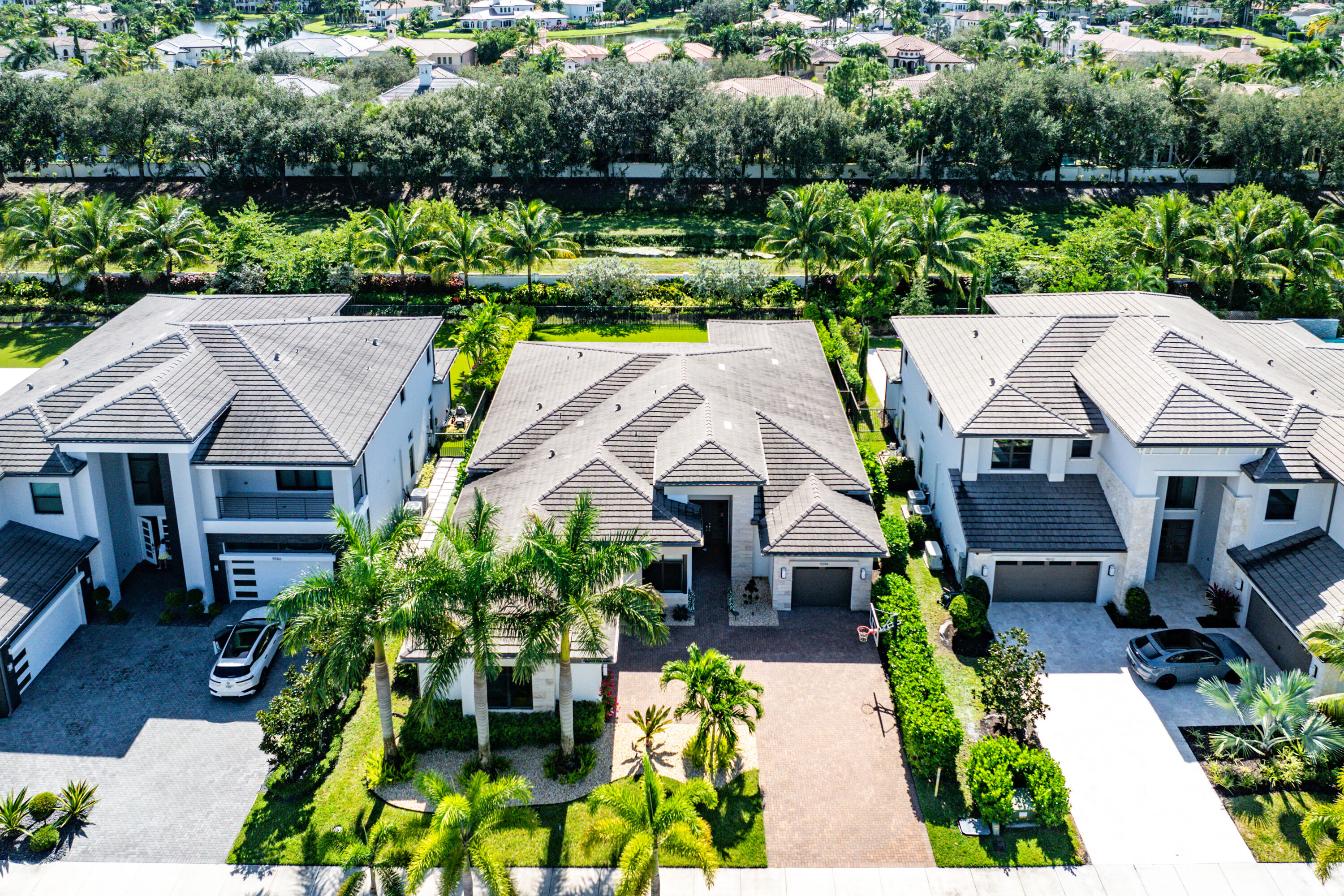 9594 Vescovato Way Boca Raton, FL 33496 - Photo 42 of 67 an aerial view of a house with a garden