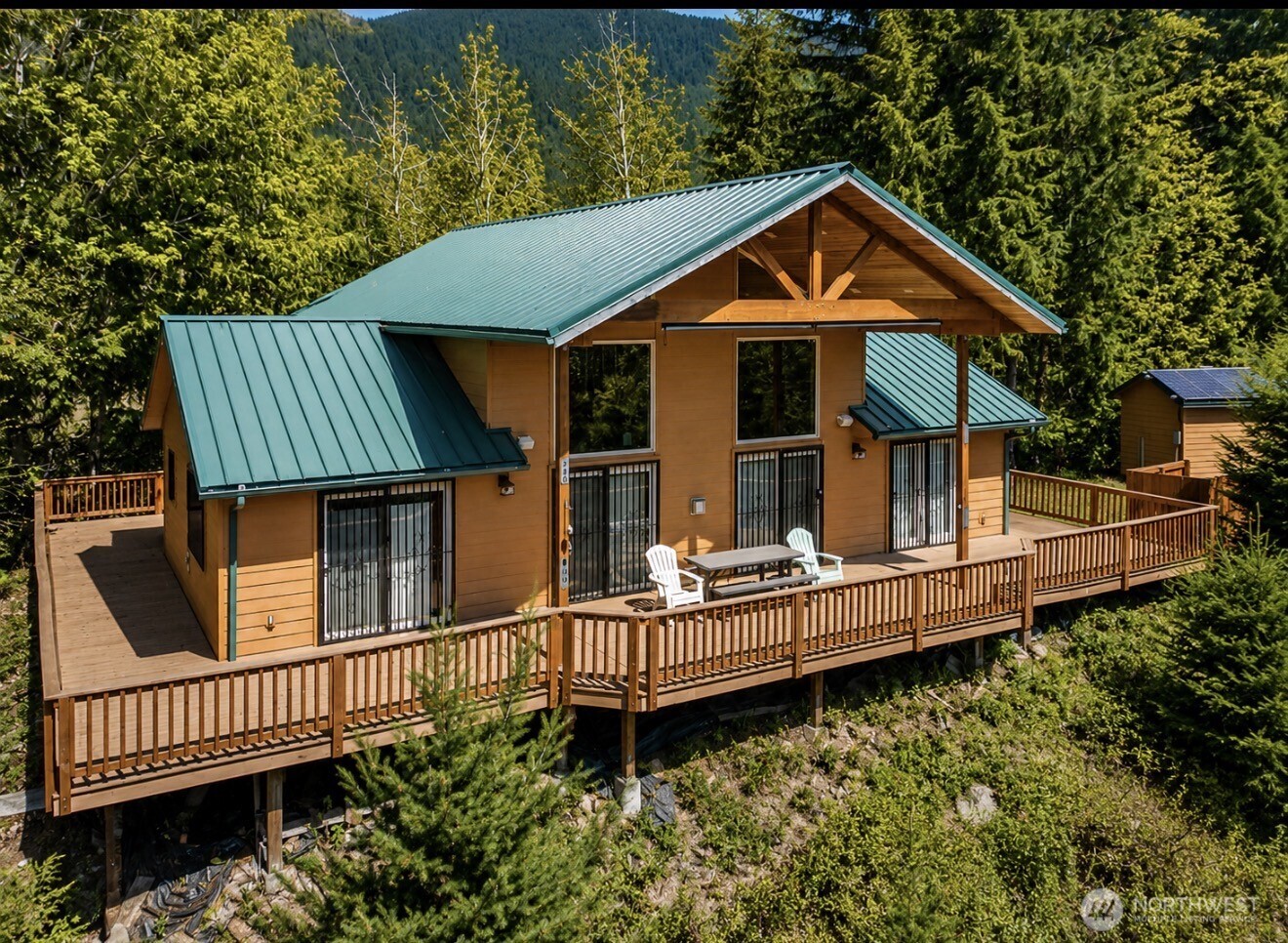 0 Boyd Road Randle, WA 98377 - Photo 1 of 39 a front view of a house with a yard