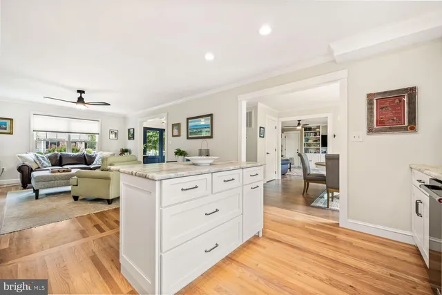 a kitchen with sink and cabinets