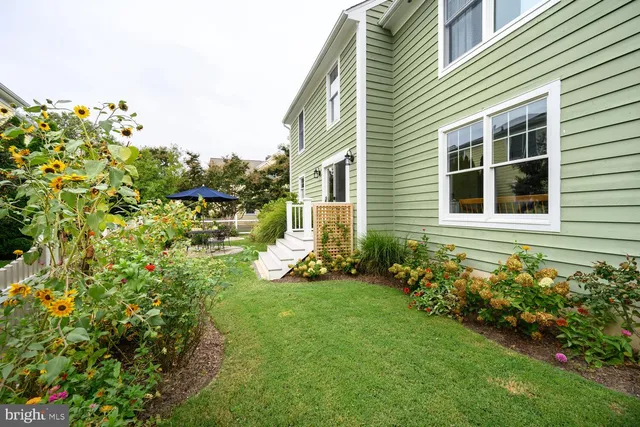 a view of a house with a garden