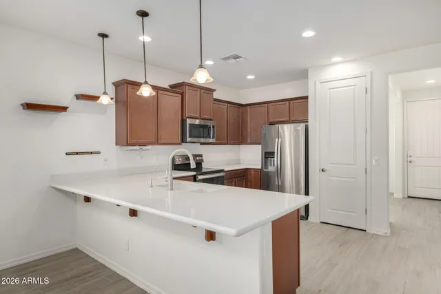 a bathroom with a sink a toilet and a bathtub