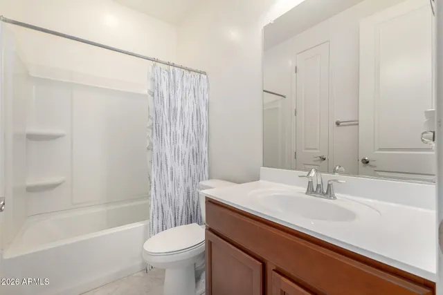 a view of empty room with windows